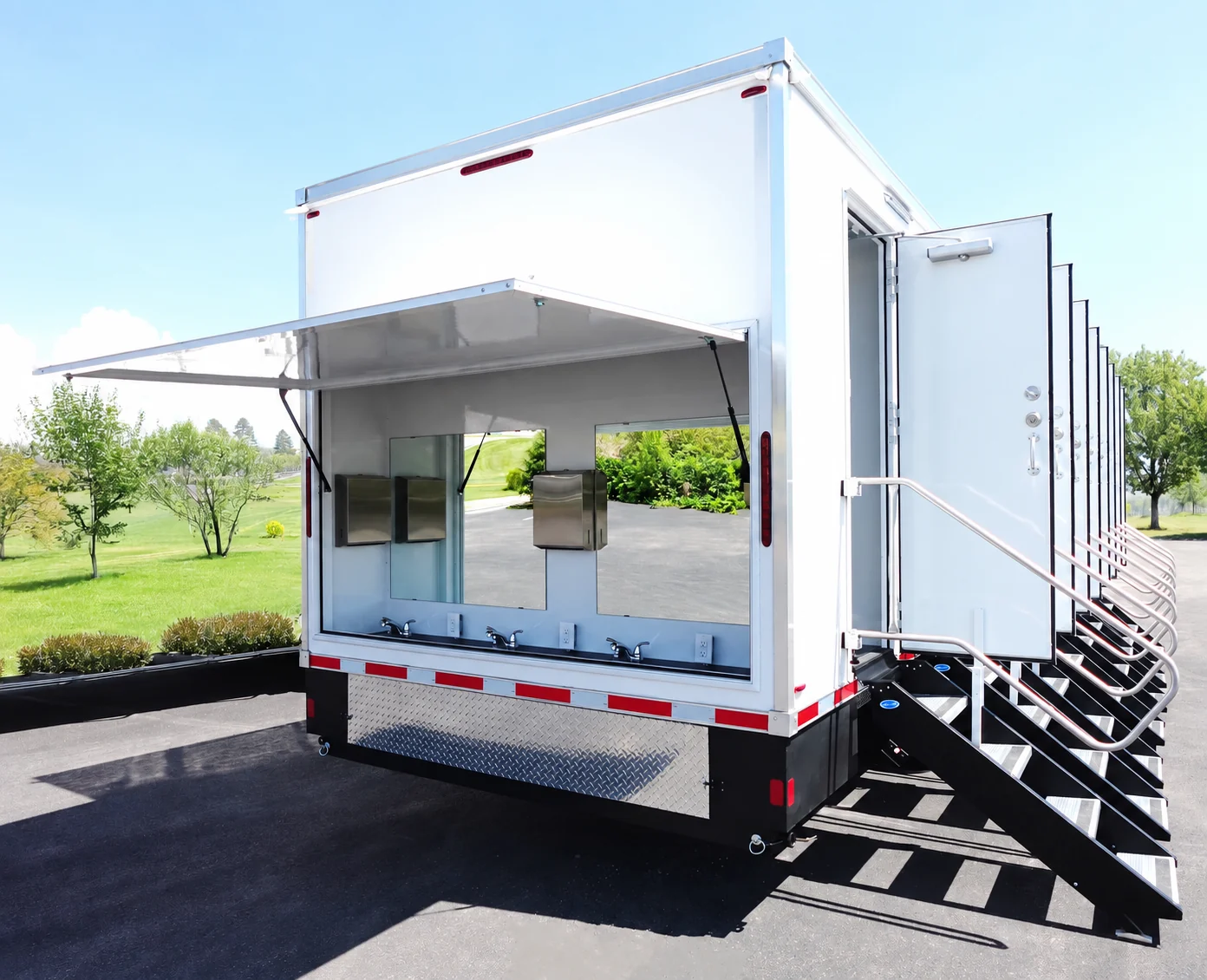 Eight-station shower trailer with exterior handwash counter